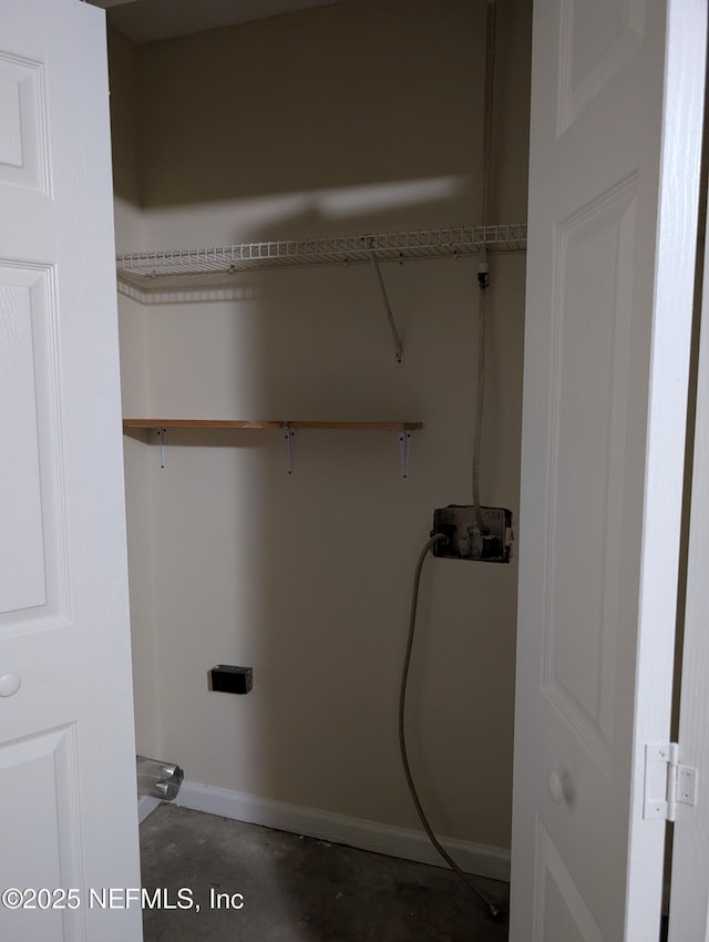 9302 Cumberland Station Dr, Jacksonville, FL 32257 - laundry area with baseboards