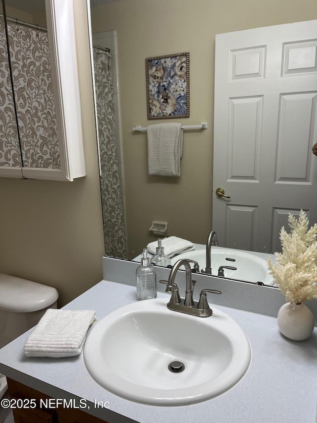 9302 Cumberland Station Dr, Jacksonville, FL 32257 - bathroom featuring vanity and toilet