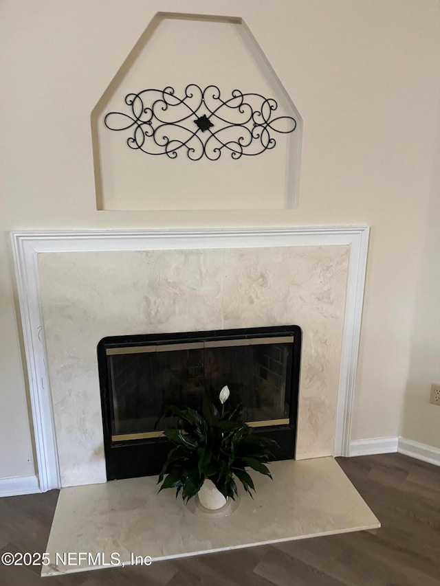 9302 Cumberland Station Dr, Jacksonville, FL 32257 - detailed view of a high end fireplace and wood finished floors