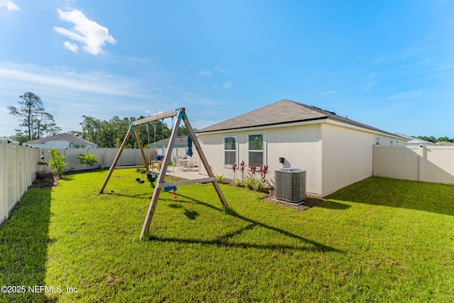 197 Jarama Cir, Saint Augustine, FL 32084 - back of house featuring a playground and a fenced backyard