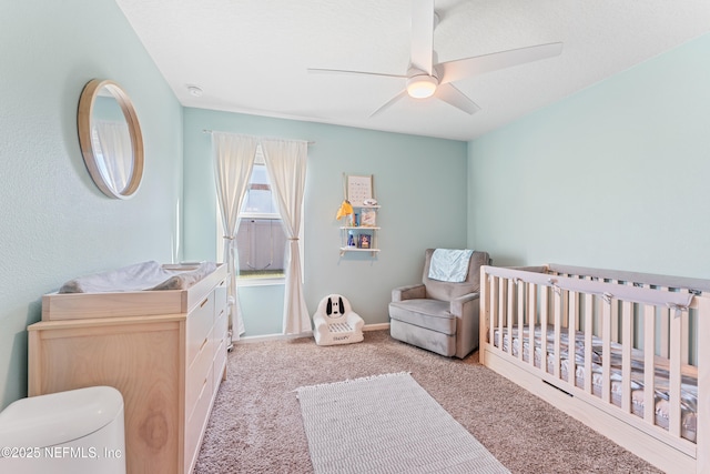 197 Jarama Cir, Saint Augustine, FL 32084 - bedroom with carpet, ceiling fan, and a nursery area