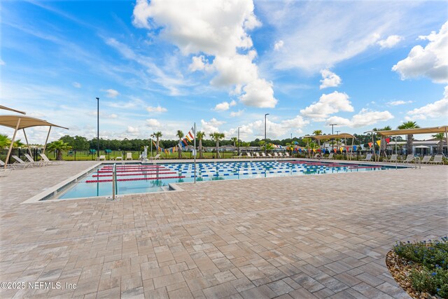 197 Jarama Cir, Saint Augustine, FL 32084 - community pool with a patio