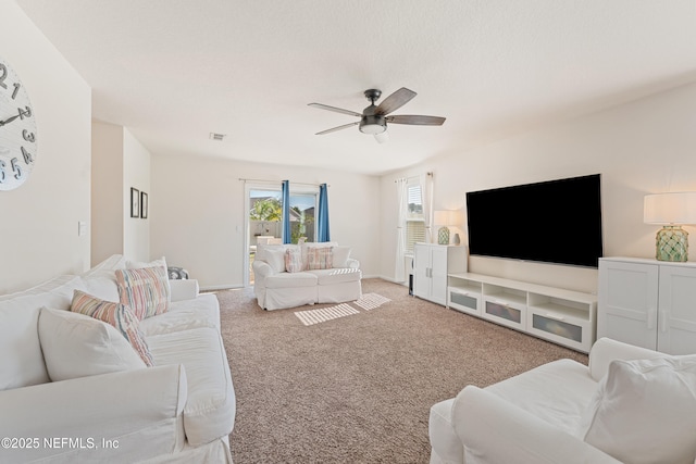 197 Jarama Cir, Saint Augustine, FL 32084 - living room featuring a ceiling fan and carpet