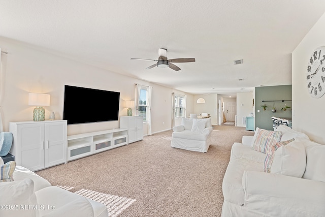 197 Jarama Cir, Saint Augustine, FL 32084 - carpeted living area featuring a ceiling fan and baseboards