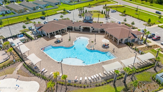 197 Jarama Cir, Saint Augustine, FL 32084 - community pool featuring a residential view