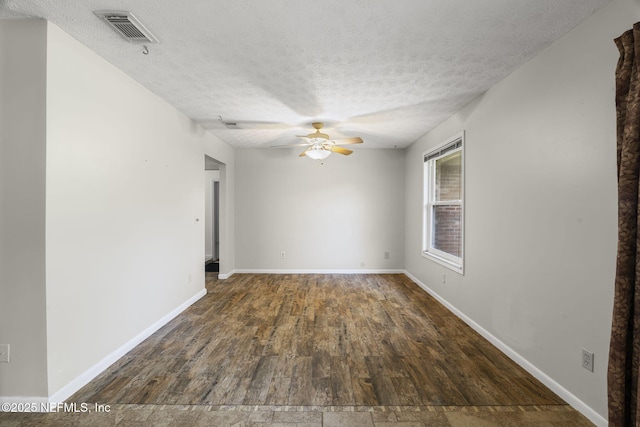 136 Hollywood Forest Dr, Fleming Island, FL 32003 - unfurnished room featuring ceiling fan, wood finished floors, and a textured ceiling