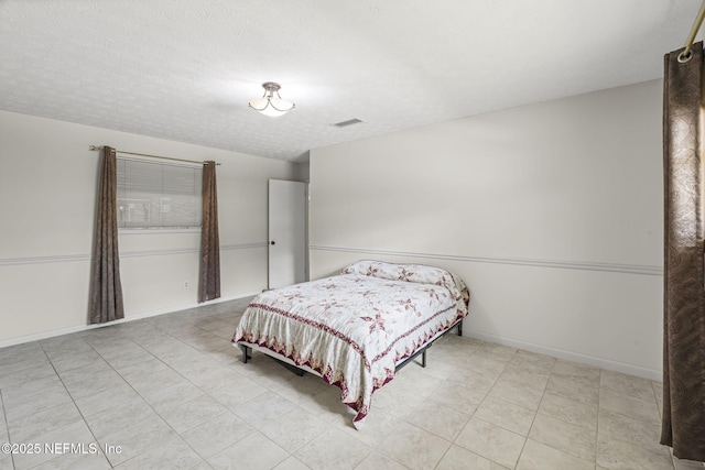 136 Hollywood Forest Dr, Fleming Island, FL 32003 - tiled bedroom with baseboards