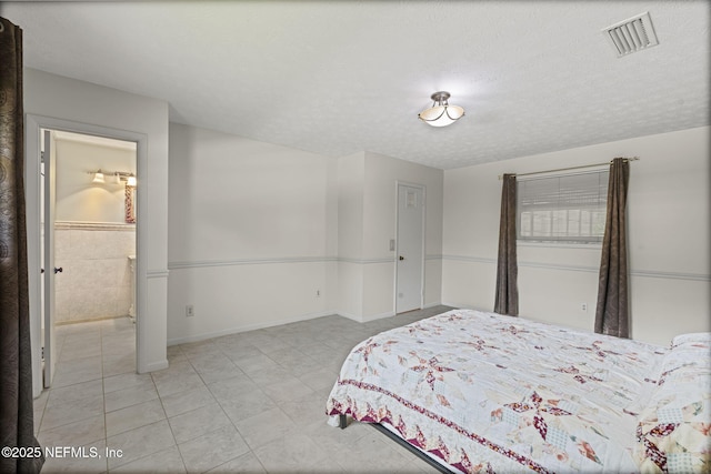 136 Hollywood Forest Dr, Fleming Island, FL 32003 - bedroom with tile patterned flooring and baseboards