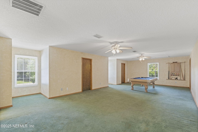 136 Hollywood Forest Dr, Fleming Island, FL 32003 - recreation room with billiards, carpet, ceiling fan, and a textured ceiling