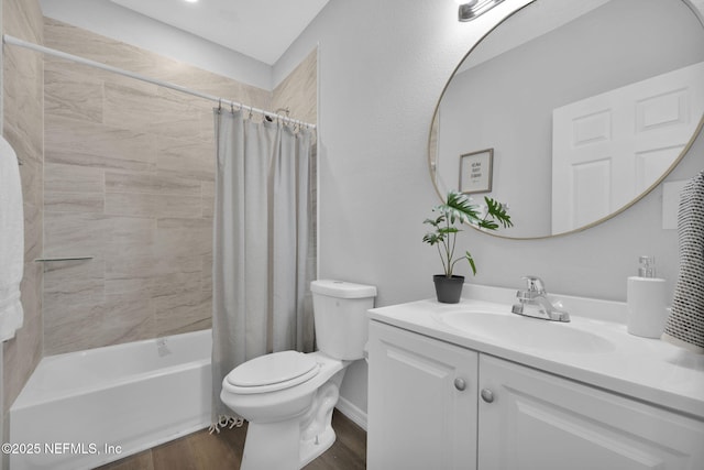 405 W 19th St, Jacksonville, FL 32206 - full bathroom featuring vanity, wood finished floors, and shower / tub combo with curtain