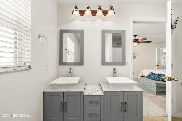 15316 Perdido Dr, Orlando, FL 32828 - full bathroom with connected bathroom, double vanity, and ceiling fan