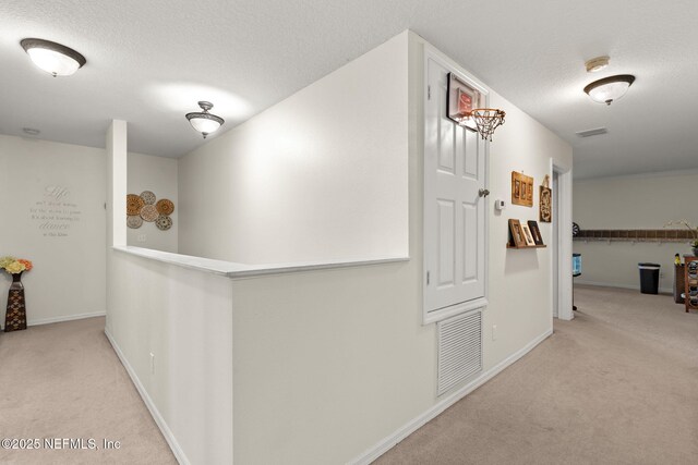 15316 Perdido Dr, Orlando, FL 32828 - hall with carpet and a textured ceiling