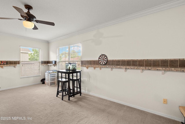 15316 Perdido Dr, Orlando, FL 32828 - dining space featuring ornamental molding, light colored carpet, and ceiling fan