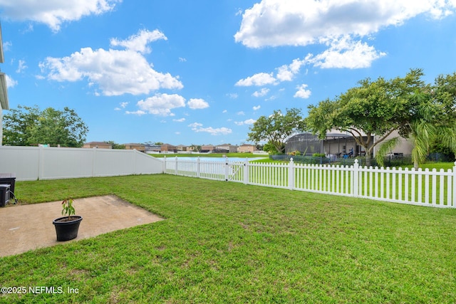 15316 Perdido Dr, Orlando, FL 32828 - fenced backyard featuring a patio area and a residential view