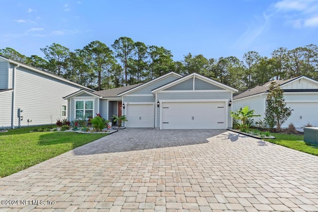 188 Sundown Covey Trl, Saint Augustine, FL 32095 - ranch-style home featuring decorative driveway, a garage, and a front yard