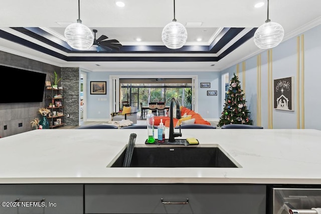 188 Sundown Covey Trl, Saint Augustine, FL 32095 - kitchen featuring open floor plan, crown molding, gray cabinetry, stainless steel dishwasher, and recessed lighting