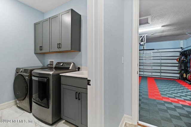 188 Sundown Covey Trl, Saint Augustine, FL 32095 - laundry room featuring washer and clothes dryer and cabinet space