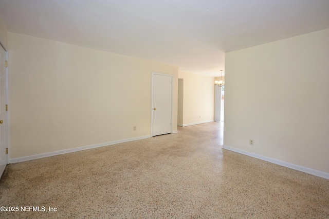 4316 Ferrarra St, Jacksonville, FL 32217 - spare room with speckled floor and a chandelier