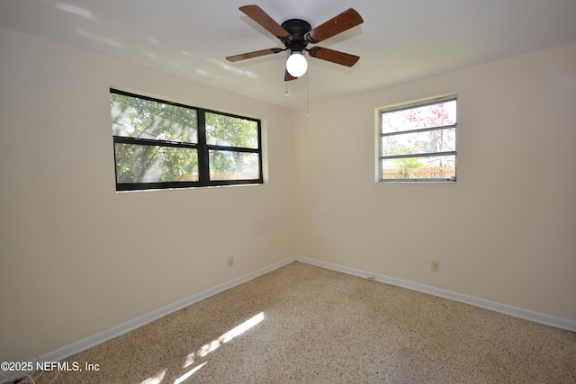 4316 Ferrarra St, Jacksonville, FL 32217 - unfurnished room with speckled floor and a ceiling fan