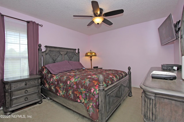 54002 Evergreen Trl, Callahan, FL 32011 - bedroom with light colored carpet, a textured ceiling, and a ceiling fan