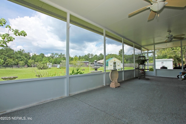 54002 Evergreen Trl, Callahan, FL 32011 - unfurnished sunroom featuring a ceiling fan