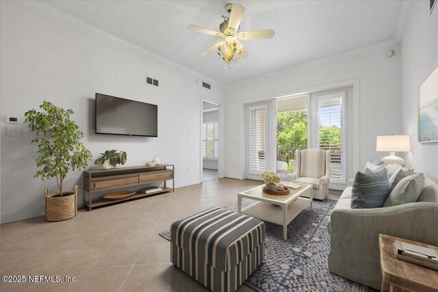 4300 S Beach Pkwy Unit 1206, Jacksonville Beach, FL 32250 - living area featuring ornamental molding, ceiling fan, and tile patterned flooring