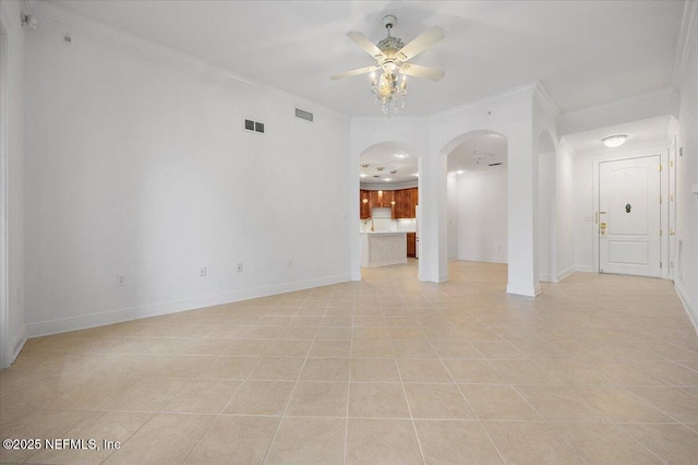 4300 S Beach Pkwy Unit 1206, Jacksonville Beach, FL 32250 - unfurnished living room with arched walkways, a ceiling fan, ornamental molding, and light tile patterned flooring