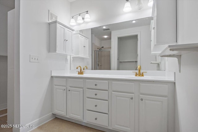4300 S Beach Pkwy Unit 1206, Jacksonville Beach, FL 32250 - full bath featuring a shower stall, double vanity, and tile patterned flooring