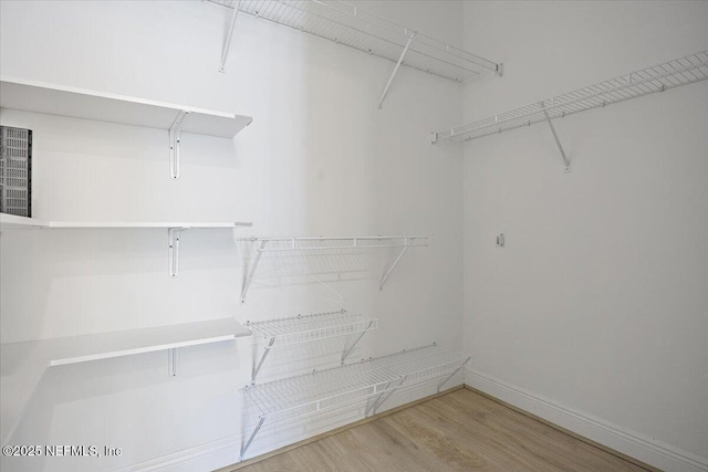 4300 S Beach Pkwy Unit 1206, Jacksonville Beach, FL 32250 - spacious closet with wood finished floors
