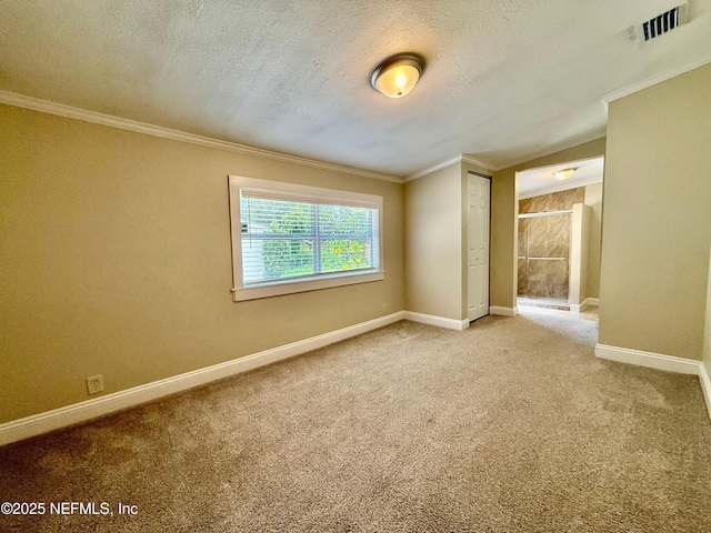4518 Astral St, Jacksonville, FL 32205 - carpeted empty room with crown molding and a textured ceiling