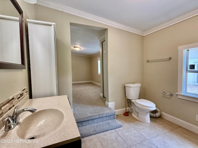 4518 Astral St, Jacksonville, FL 32205 - bathroom featuring ornamental molding, vanity, and tile patterned floors