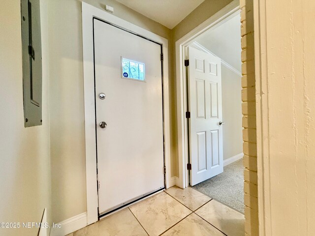 4518 Astral St, Jacksonville, FL 32205 - foyer entrance with baseboards and light colored carpet