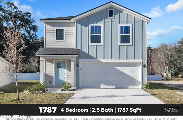 3559 Mildred Way, Jacksonville, FL 32254 - view of front of house featuring board and batten siding, a garage, driveway, and roof with shingles