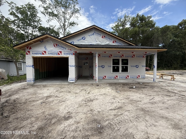 85 Delmonte St, Baldwin, FL 32234 - property under construction with a porch and a garage