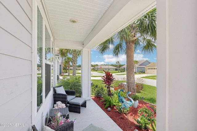 44 Spotted Owl Ln, Saint Augustine, FL 32095 - covered porch featuring a residential view