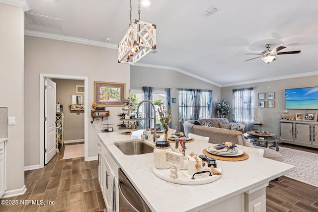 44 Spotted Owl Ln, Saint Augustine, FL 32095 - kitchen with wood finish floors, stainless steel dishwasher, white cabinetry, a ceiling fan, and light stone countertops