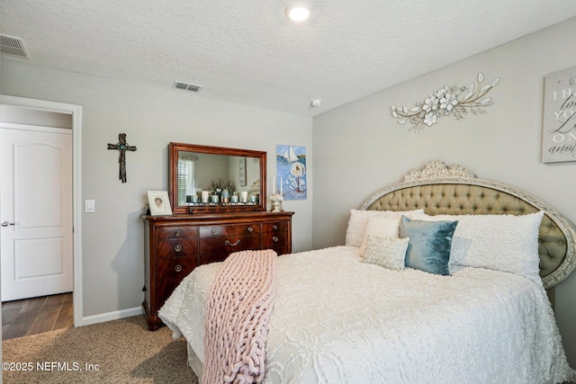 44 Spotted Owl Ln, Saint Augustine, FL 32095 - bedroom with a textured ceiling and carpet floors