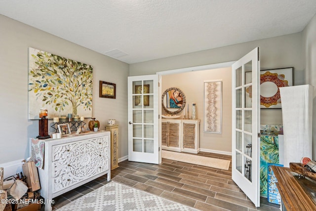 44 Spotted Owl Ln, Saint Augustine, FL 32095 - interior space featuring french doors and wood finished floors