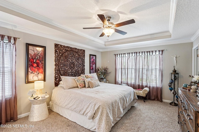 44 Spotted Owl Ln, Saint Augustine, FL 32095 - carpeted bedroom with a raised ceiling, ornamental molding, ceiling fan, and a textured ceiling