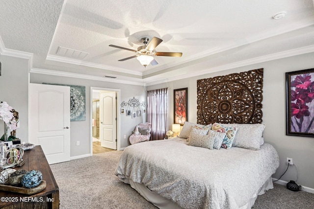 44 Spotted Owl Ln, Saint Augustine, FL 32095 - bedroom featuring carpet floors, a raised ceiling, crown molding, a ceiling fan, and ensuite bathroom