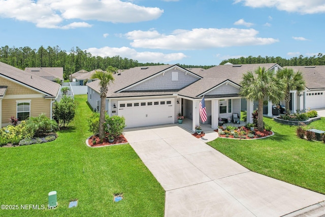 44 Spotted Owl Ln, Saint Augustine, FL 32095 - single story home featuring concrete driveway, an attached garage, a residential view, and a porch