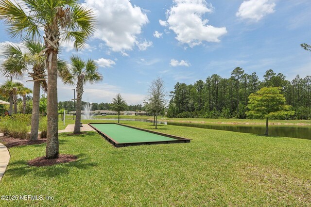 44 Spotted Owl Ln, Saint Augustine, FL 32095 - surrounding community featuring a lawn, a water view, and a bocce ball area