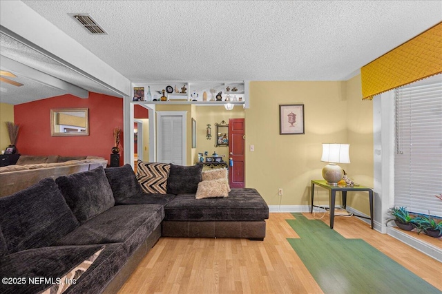 1179 Kincross Ct, Orange Park, FL 32065 - living area featuring wood finished floors and a textured ceiling