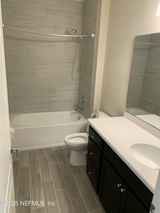 488 Broomsedge Cir, Saint Augustine, FL 32095 - full bath with vanity, bathtub / shower combination, and wood tiled floors