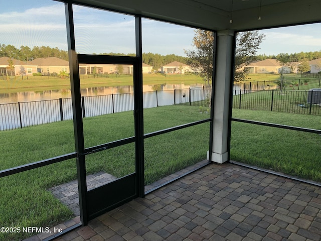 488 Broomsedge Cir, Saint Augustine, FL 32095 - unfurnished sunroom with a water view and a residential view