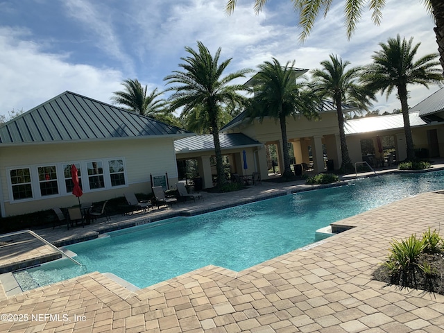 488 Broomsedge Cir, Saint Augustine, FL 32095 - outdoor pool featuring a patio