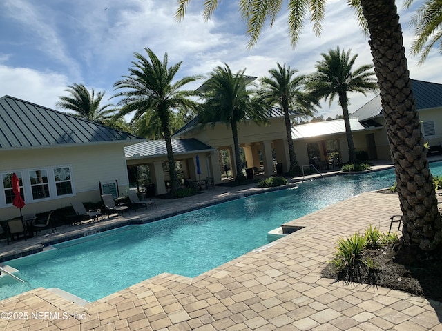 488 Broomsedge Cir, Saint Augustine, FL 32095 - community pool featuring a patio area