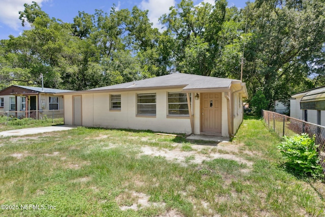 9043 8th Ave, Jacksonville, FL 32208 - view of front facade featuring concrete block siding