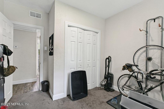 950 Ashton St, Jacksonville, FL 32208 - exercise area featuring carpet and baseboards