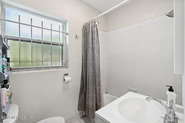 950 Ashton St, Jacksonville, FL 32208 - full bathroom with a sink and shower / bath combo